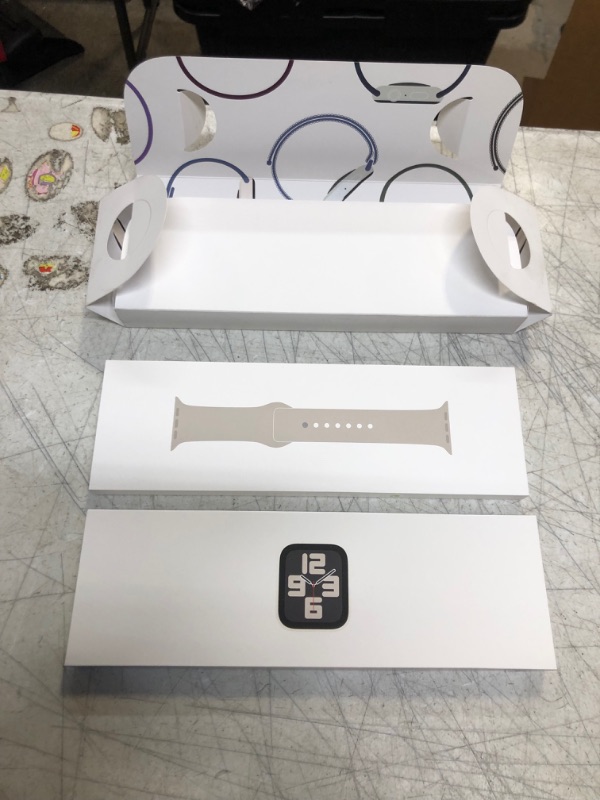 Photo 2 of +++FACTORY SEALED+++ Apple Watch SE (2nd Gen) [GPS 40mm] Smartwatch with Starlight Aluminum Case with Starlight Sport Band M/L. Fitness & Sleep Tracker, Crash Detection, Heart Rate Monitor Starlight Aluminum Case with Starlight Sport Band 40mm M/L - fits 