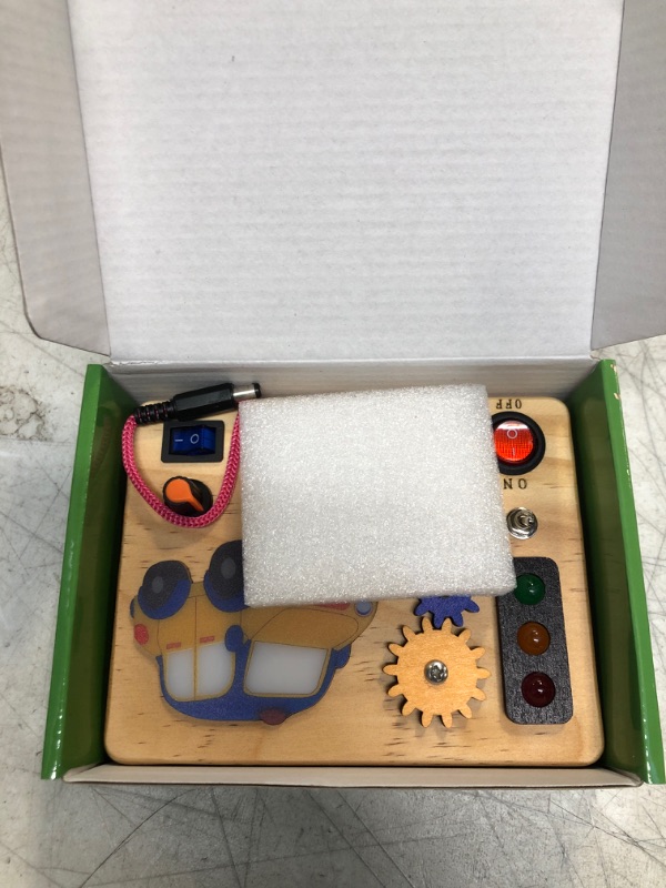 Photo 1 of Auney Montessori Busy Board with Traffic Led Lights,Wooden Sensory Toys for Toddlers 1,Baby Travel Toys with 7 Different Led Lights Sound Button,Educational Toys for 1+ Year Old Boy Car Style Gift