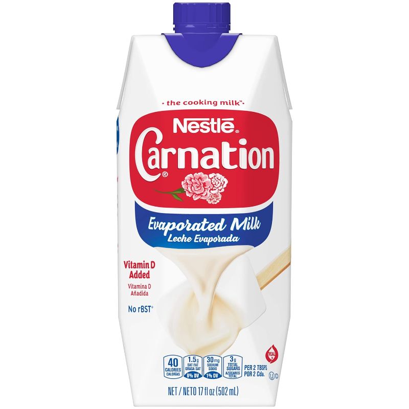 Photo 1 of +++SEALED++ NESTLE CARNATION  EVAPORATED MILK 12/17 FL OZ (502 ml) CARTONS 