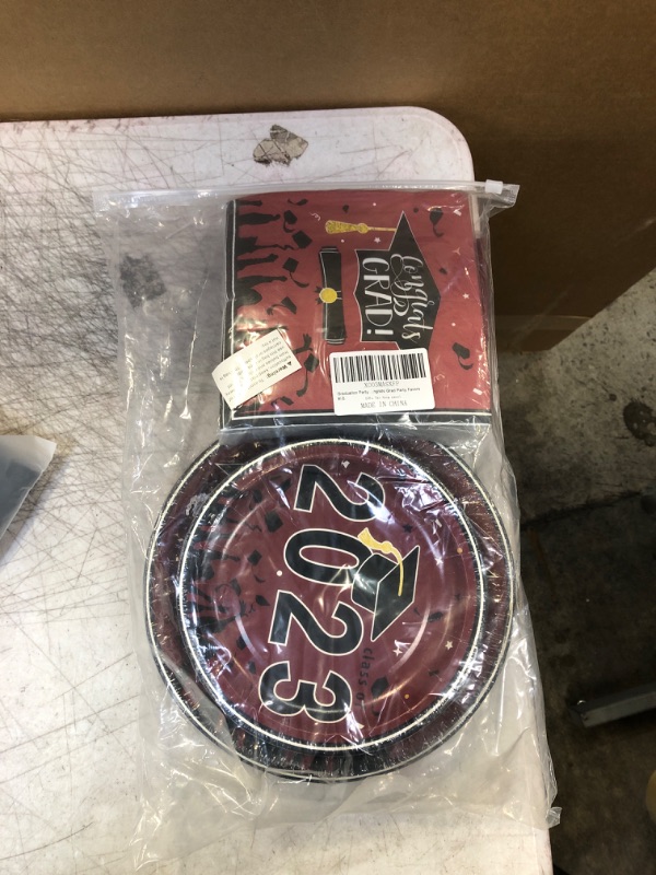 Photo 1 of 200pcs Graduation Party Decorations for Class of 2023 Maroon Congrats Grad Disposable Paper Plates and Napkins for College High School Graduation Party Supplies Serves 50