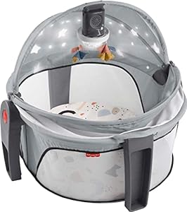 Photo 1 of Fisher-Price Baby Portable Baby Bassinet And Play Space Deluxe On-The-Go Projection Dome With Lights Music And Canopy,Paper Shapes
