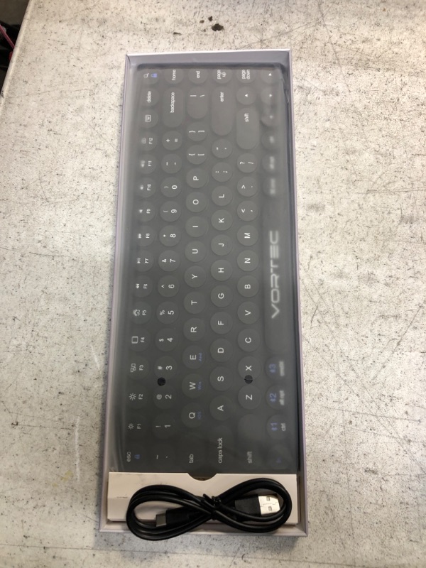 Photo 1 of Vortec Rechargeable Bluetooth Wireless Multi Device Keyboard | Connect 3 Devices Simultaneously | Compatible with iPad, iPhone, Android Phone & Tablet, Mac, PC (Black)