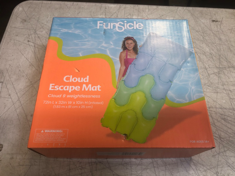 Photo 2 of ++UNABLE TO TEST++ Funsicle 6 ft Cloud Escape Inflatable Water Lounge Mat, With Cushioned Headrest Orange
