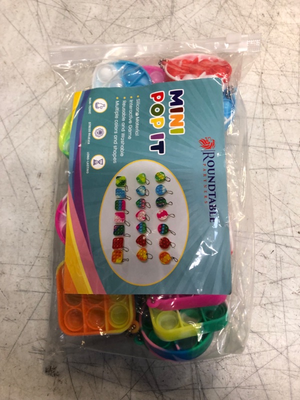 Photo 1 of Mini Pop Its, Pop It Party Favors, Fidget Keychain, Stress Relief Fidget Toys, Screen Free Car Toys for Kids, Ideal for All Ages, Goody Bag Fillers, Multicolor, Multi Shape