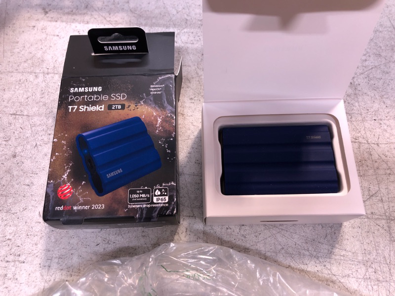 Photo 2 of Samsung T7 Shield 2TB Portable SSD, USB 3.2 Gen2, Rugged, IP65 Rated, for Photographers, Content Creators and Gaming, External Solid State Drive (MU-PE2T0R/AM, 2022), Blue Blue 2 TB