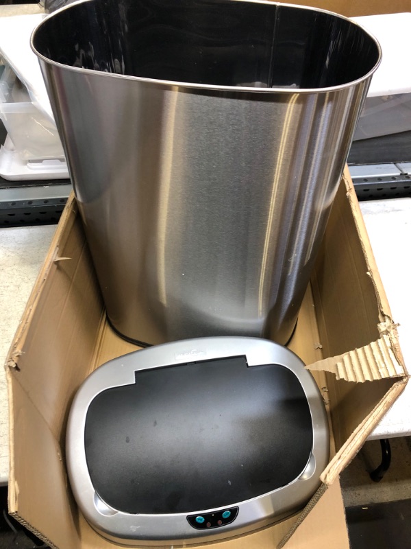 Photo 2 of **MAJOR DAMAGE TO LID, WHICH DOESN'T FIT PROPERLY** iTouchless 13 Gallon SensorCan Touchless Trash Can with Odor Control System, Stainless Steel, Oval Shape Kitchen Bin Sensor Can