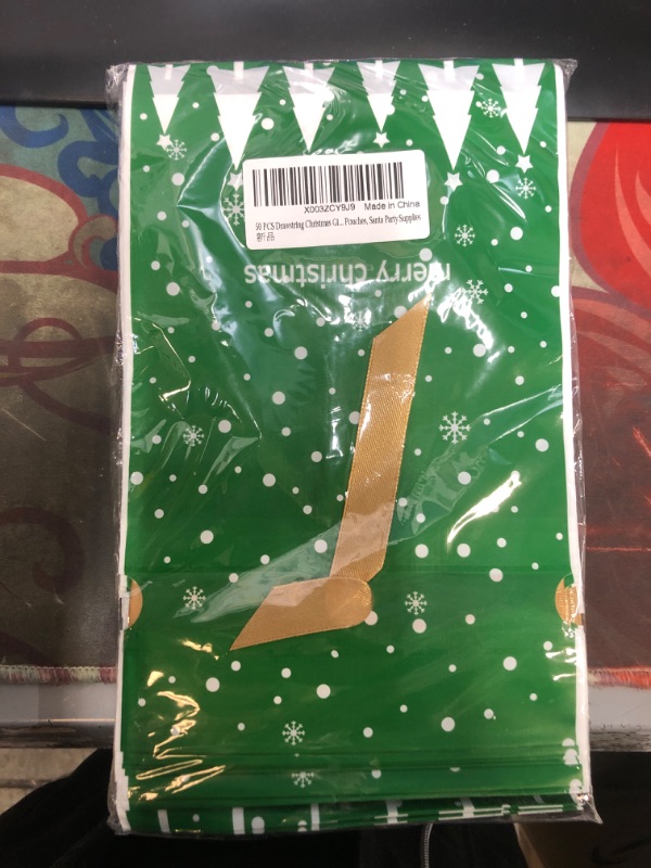 Photo 1 of 50 PCS Drawstring Christmas Gift Bags, Small Christmas Wrapping Bags with Ribbon Ties, Plastic Xmas Treat Sacks for Sacks, Candy Pouches, Santa Party Supplies