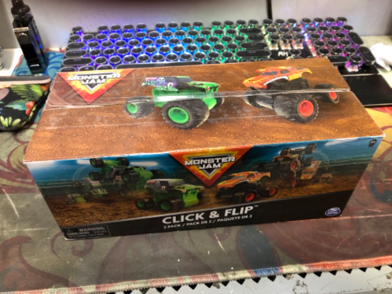 Photo 2 of Monster Jam, 2-Pack Official Grave Digger and El Toro Loco Clip & Flip Monster Trucks, 1:43 Scale Kids Toys for Boys