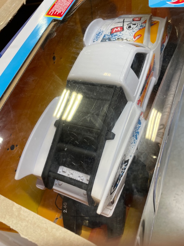 Photo 2 of ?Hot Wheels Remote Control Truck, White Ford RC Vehicle with Full-Function Remote Control, Large Wheels & High-Performance Engine, 2.4 GHz with Range of 65 Feet HW TEAM HW JUMP TRUCK RC