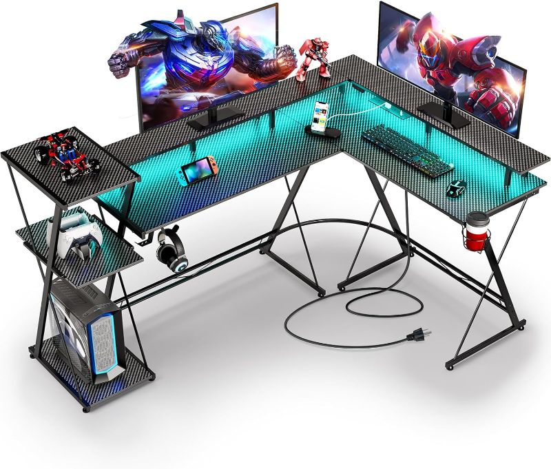 Photo 1 of SEVEN WARRIOR L Shaped Gaming Desk with LED Lights & Power Outlets, 58” Reversible Computer Desk with Storage Shelf & Monitor Stand, Corner Desk with Cup Holder, with Headphone Hook, Black
