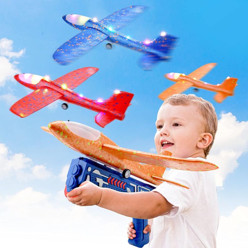 Photo 1 of BELLOCHIDDO 3 Pack Airplane Launcher Toy, LED Glider Catapult Plane with 2 Flight Modes, Outdoor Toys Birthday Gifts for 4 5 6 7 8 9 10 11 12 Year Old
