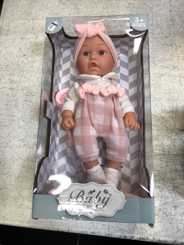 Photo 2 of Enjoyin 12'' Baby Doll in Gift Box with Pink Cloths, Pacifier, 13''x13'' Microfabric Blanket, and Feeding Bottle. Gift Idea for Ages 3+