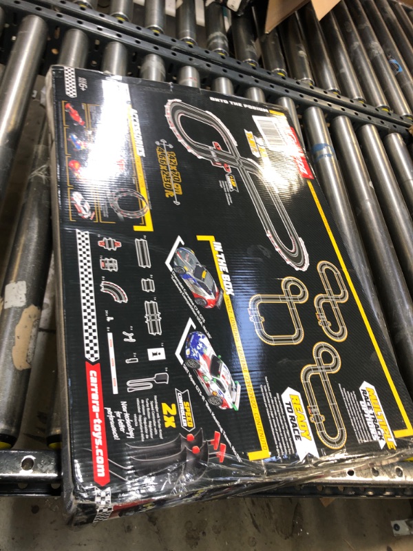 Photo 2 of Carrera GO!!! 62521 onto The Podium Electric Powered Slot Car Racing Kids Toy Race Track Set Includes 2 Hand Controllers and 2 Cars in 1:43 Scale