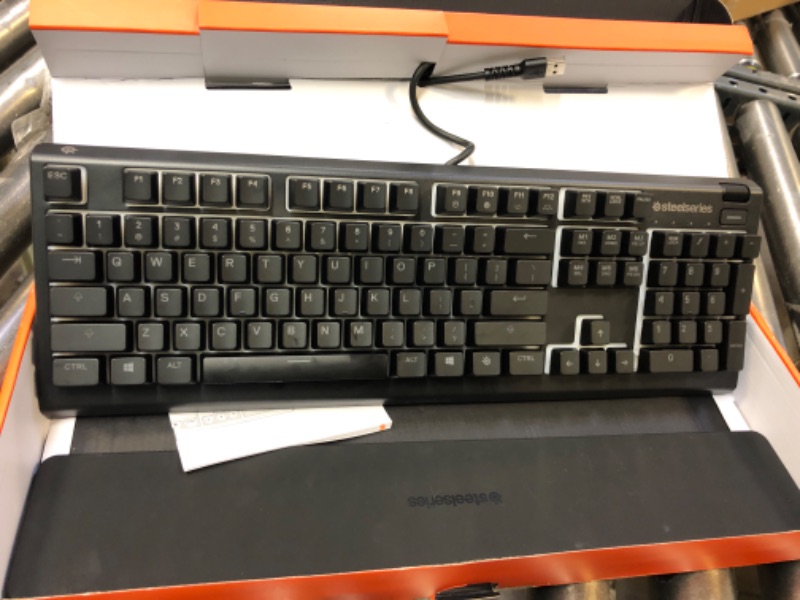 Photo 2 of SteelSeries Apex 3 RGB Gaming Keyboard – 10-Zone RGB Illumination – IP32 Water Resistant – Premium Magnetic Wrist Rest (Whisper Quiet Gaming Switch)