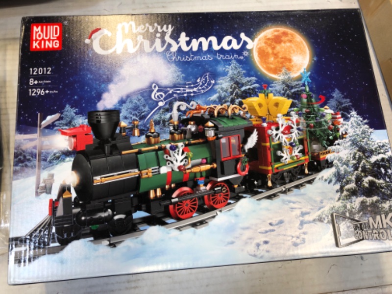 Photo 2 of Christmas Train Set Building Blocks with Rotating Christmas Tree, Electric Music Steam Train Building Kit with Remote Control Birthday for Kids Teens Adults (1296+ pcs)