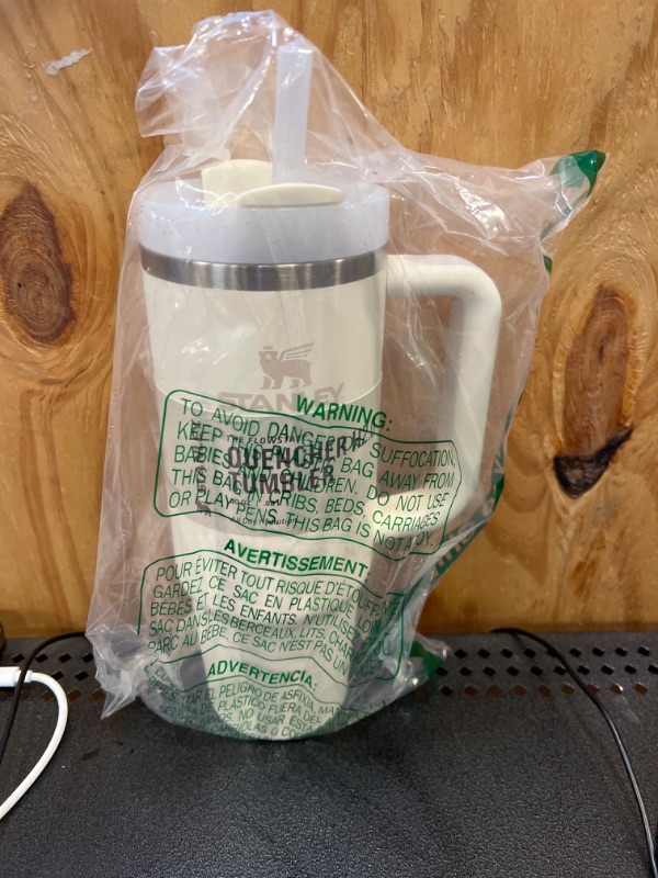 Photo 2 of Stanley Quencher H2.0 FlowState Stainless Steel Vacuum Insulated Tumbler with Lid and Straw for Water, Iced Tea or Coffee, Smoothie and More 30 oz Cream