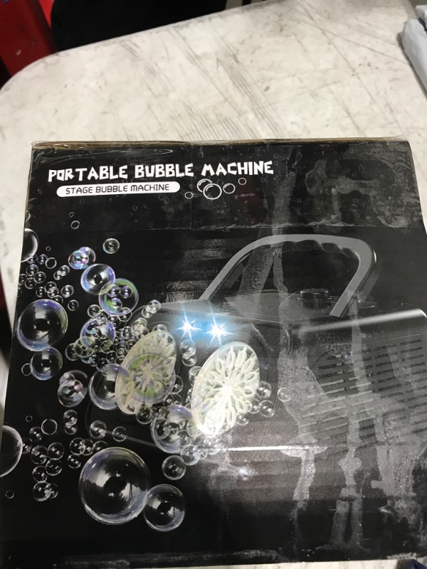 Photo 1 of Automatic Bubble Machine,Bubble Blower with 2 Fans 20000+Bubbles Per/Min,Electric Bubble Maker for Kids Toddlers,Operated by Plug-in or Batteries,with 10xBubble Solution,Bubble Toys for Outdoor