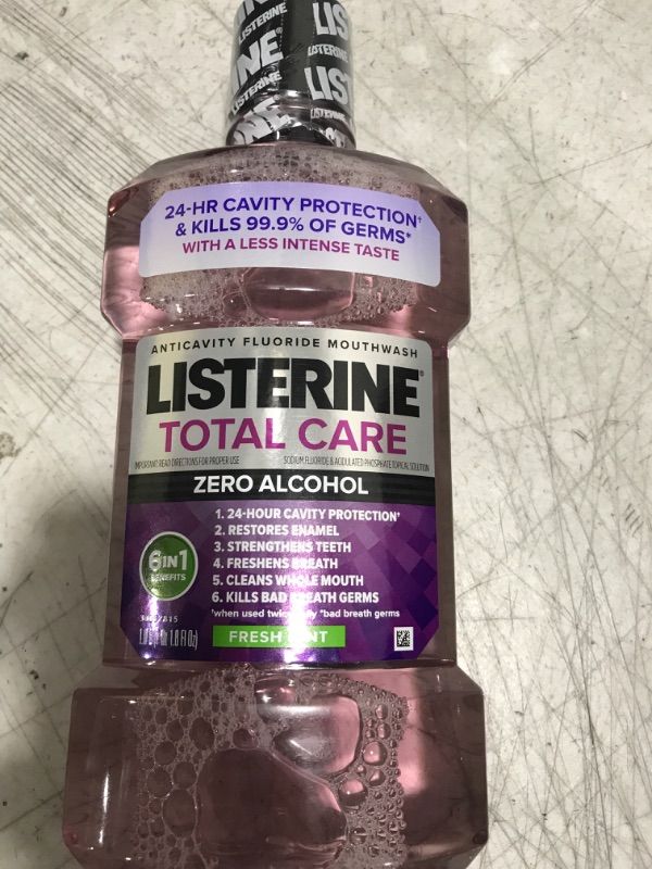 Photo 2 of Listerine Total Care Alcohol-Free Anticavity Fluoride Mouthwash, 6 Benefit Oral Rinse to Help Kill 99% of Germs That Cause Bad Breath, Strengthen Enamel, Fresh Mint Flavor, 1 L  LISTERINE® Mouthwash