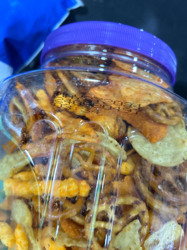 Photo 2 of Utz Party Mix - 26 Ounce Barrel - Tasty Snack Mix Includes Corn Tortillas, Nacho Tortillas, Pretzels, BBQ Corn Chips and Cheese Curls, Easy and Quick Party Snacks, Cholesterol Free and Trans-Fat Free BEST BY MAY 27 2024