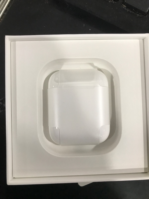 Photo 2 of Apple AirPods with Charging Case (Latest Model)