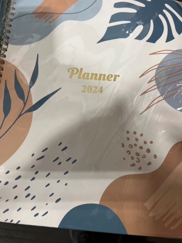 Photo 2 of Planner 2024 Monthly Planner -Jan.2024 To Dec. 2024, 8.9" X 11",12-Months Planner With Monthly Tabs, Twin-Wire Biding, Holidays, Notes Pages, Back Pocket - Monstera deliciosa 60 Pages