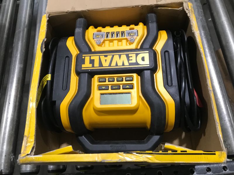 Photo 2 of DEWALT DXAEPS14 1600 Peak Battery Amp 12V Automotive Jump Starter/Power Station with 500 Watt AC Power Inverter, 120 PSI Digital Compressor, and USB Power , Yellow