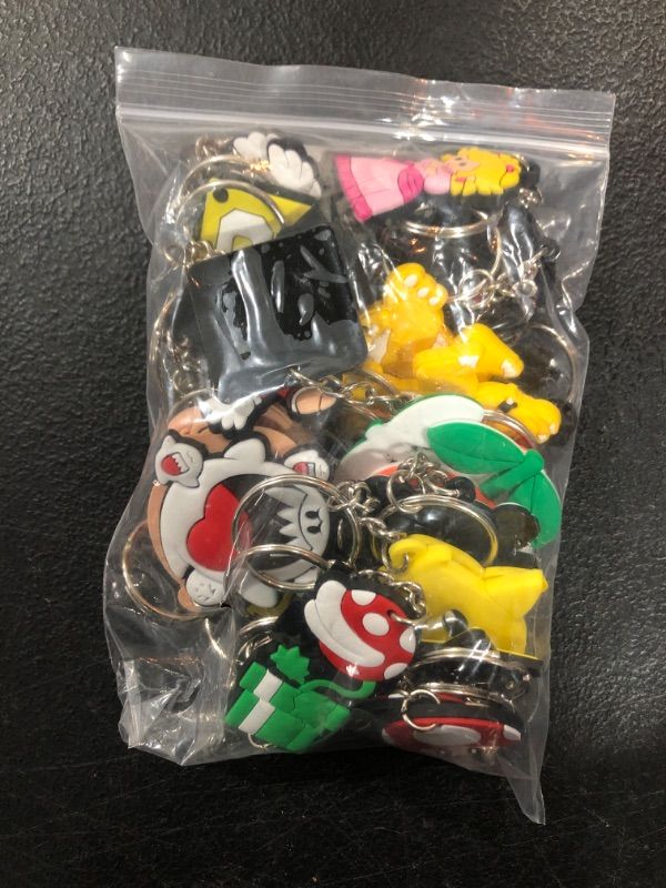 Photo 1 of 28 pcs Mario theme keychains.