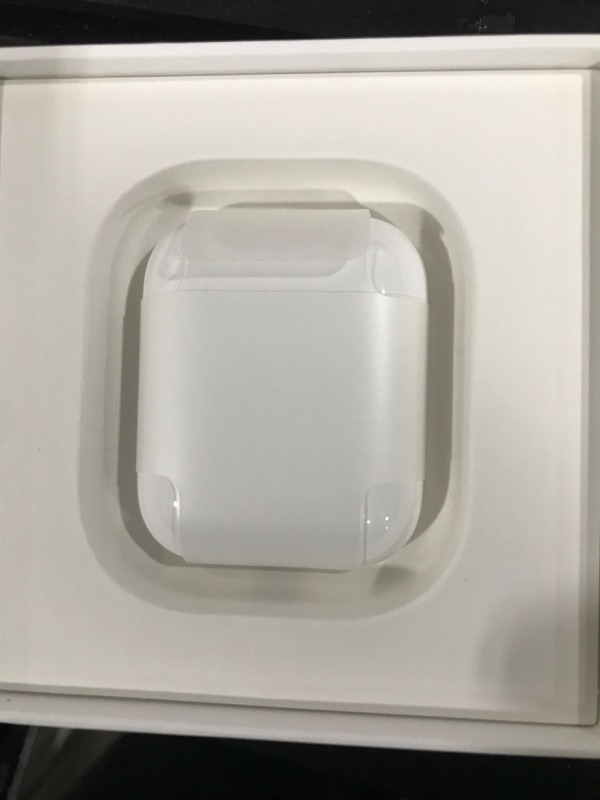 Photo 2 of Apple AirPods with Charging Case (Latest Model)