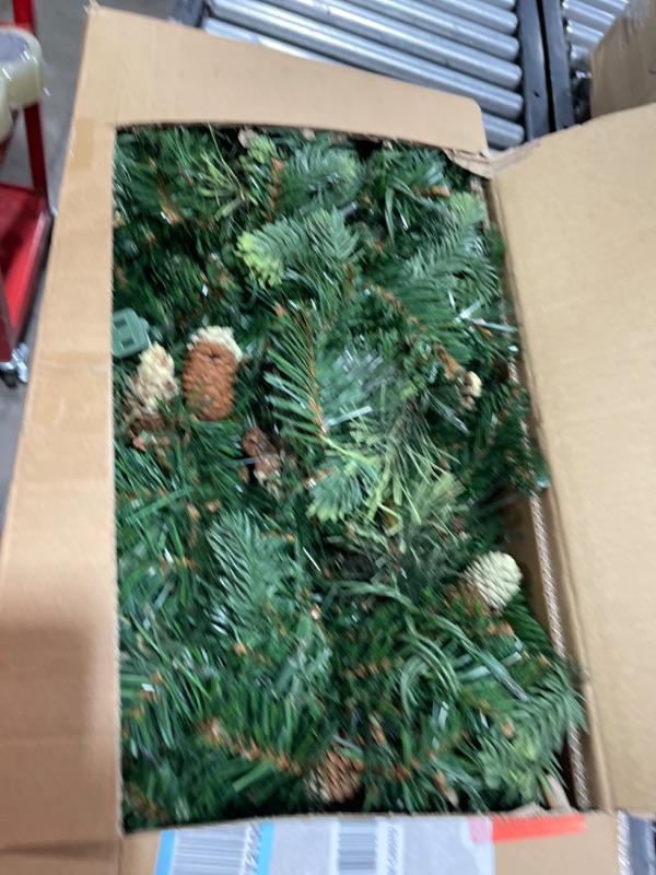Photo 2 of National Tree Company Pre-Lit Artificial Christmas Garland, Green, Carolina Pine, White Lights, Decorated with Pine Cones, Plug In, Christmas Collection, 9 Feet 100 Lights Tree1026094817
