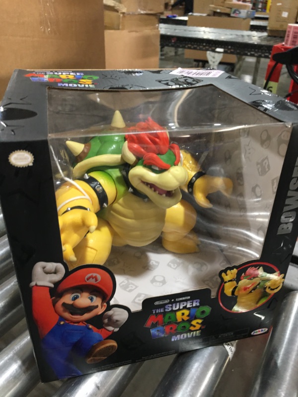 Photo 2 of The Super Mario Bros. Movie 7-Inch Feature Bowser Action Figure with Fire Breathing Effects