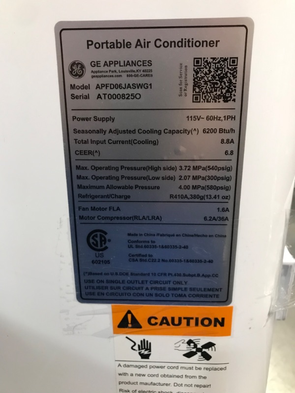 Photo 1 of **READ NOTES, MINOR DAMAGE**
GE Portable 3-in-1 Air Conditioner with Dehumidifier and Fan, 9,000 BTU, Cooling for 250 sq ft rooms, Includes Remote, Vent Hose and Easy Window Install Kit