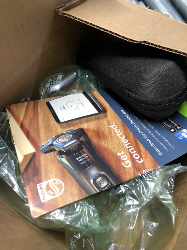 Photo 2 of ***ITEM TESTED FOR POWER, UNABLE TO TEST FURTHER***
Philips Norelco Shaver 7600, Rechargeable Wet & Dry Electric Shaver with SenseIQ Technology, Quick Clean Pod, Travel Case & Pop-up Trimmer, S7886/84