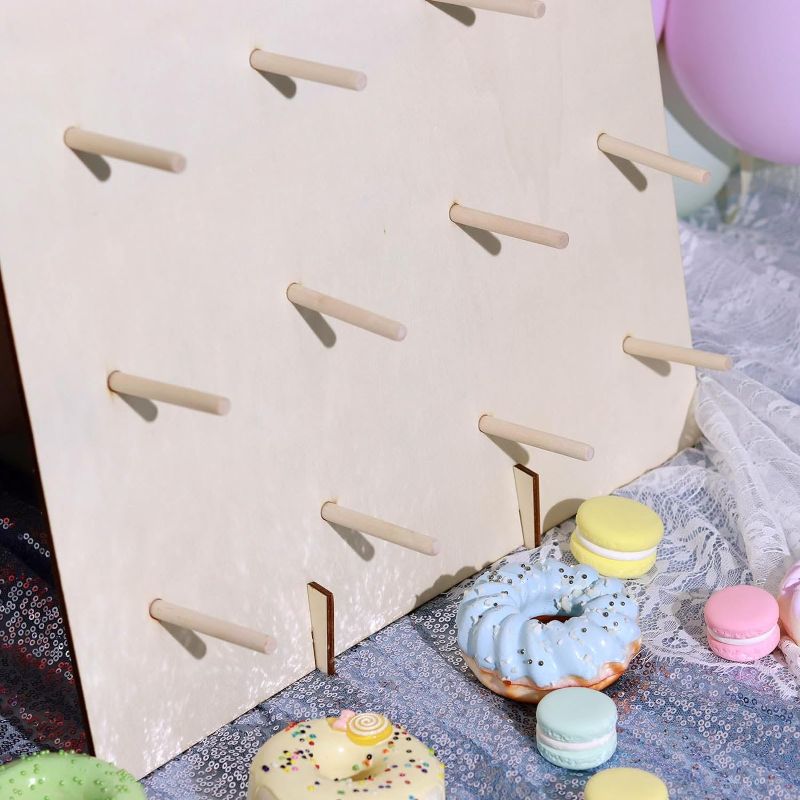 Photo 2 of **stock photo for reference see pictured****minor damage on top corners. chipping of paint**
suzile large donut display wedding
