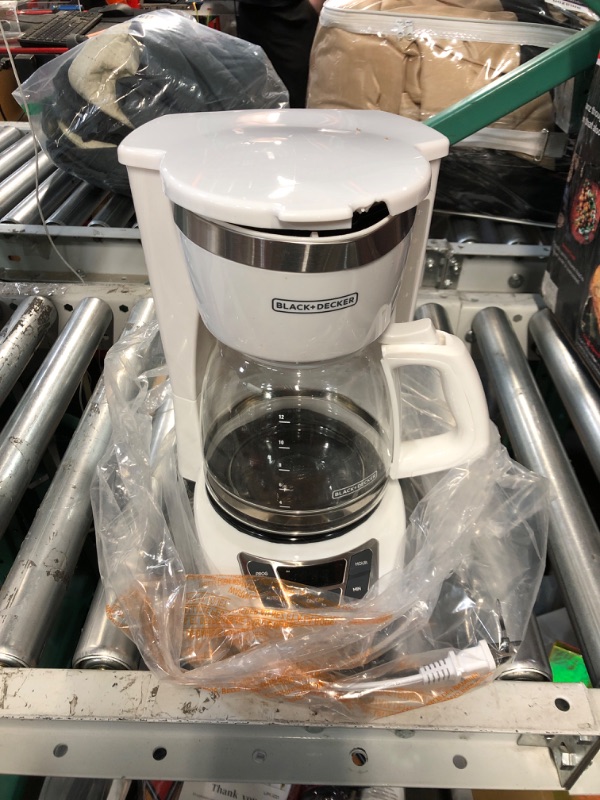 Photo 2 of ***USED - DAMAGED - SEE PICTURES - UNABLE TO TEST***
Black+Decker CM1160W-1 CM1160W 12-Cup Programmable Coffeemaker, White/Stainless Steel White/Stainless Steel Coffeemaker