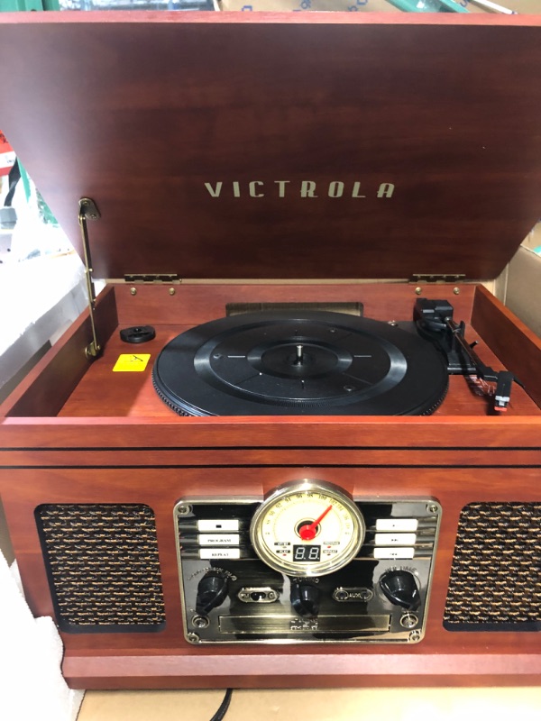 Photo 2 of NON REFUNDABLE - PARTS ONLY **TURNS ON*NEEDS NEW NEEDLE***
Victrola Nostalgic 6-in-1 Bluetooth Record Player & Multimedia Center with Built-in Speakers