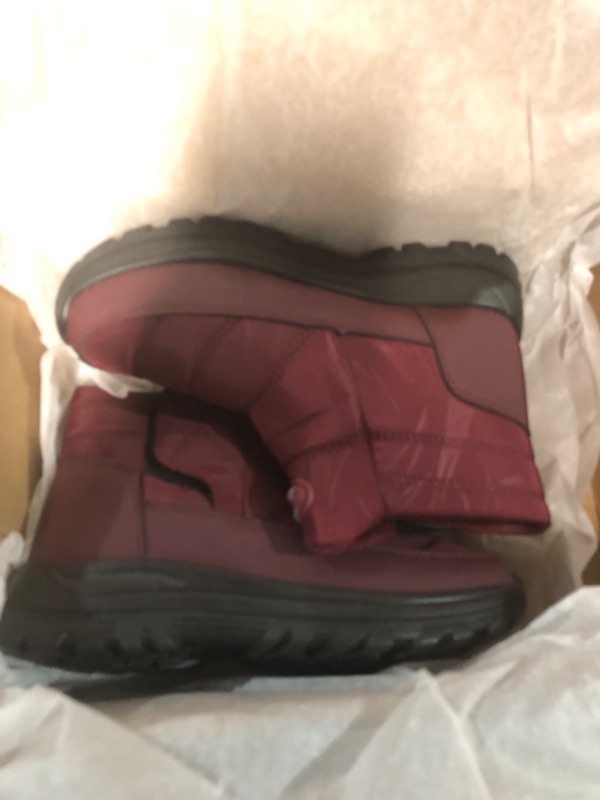 Photo 1 of GIRLS BURGUNDY SNOW BOOTS BOTTOM SHOWS 230 LOOKS LIKE A SIZE 3 OR 4 