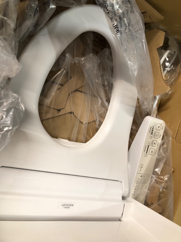 Photo 1 of **PARTS ONLY NO REFUNDS**TOTO SW3074#01 WASHLET C2 Electronic Bidet Toilet Seat with PREMIST and EWATER+ Wand Cleaning, Elongated, Cotton White C2 Elongated Cotton White