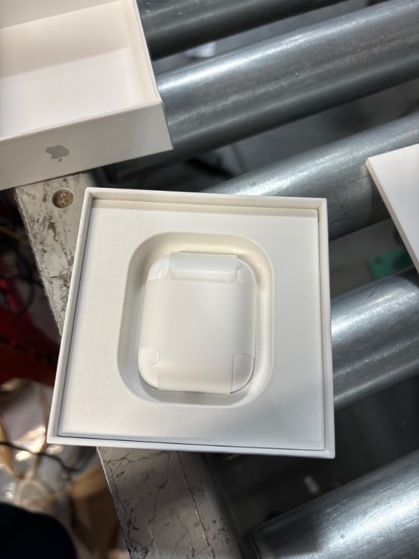Photo 1 of AirPods with Charging Case