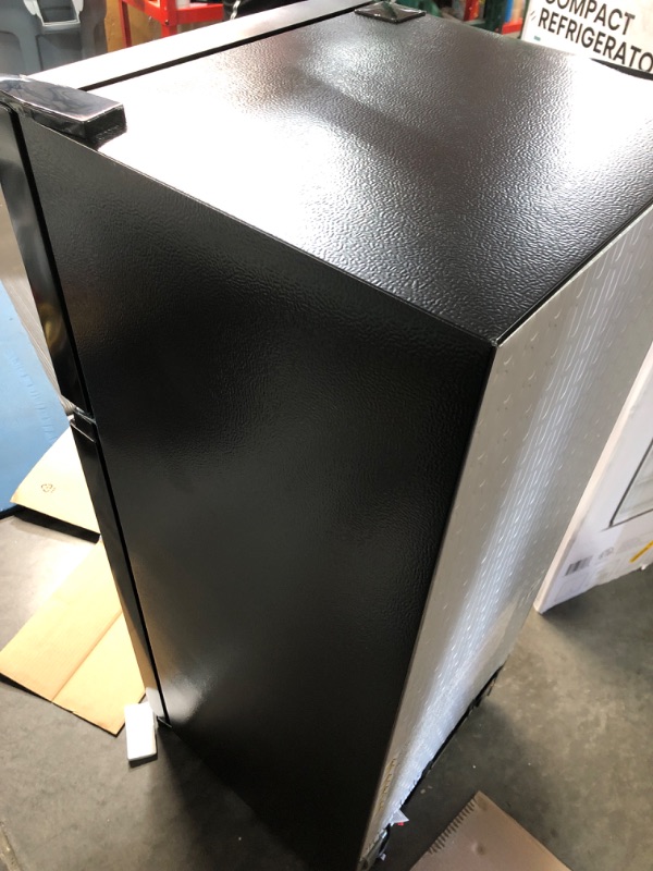 Photo 1 of Hisense 4.4-cu ft Mini Fridge with Freezer (Black) ENERGY STAR (SINGLE DENT ON TOP EDGE)