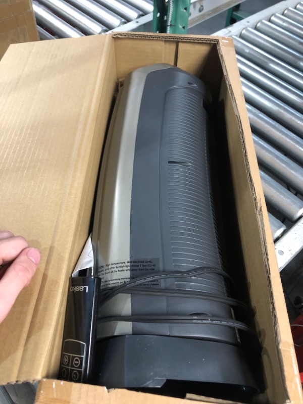 Photo 1 of Lasko 1500W Digital Ceramic Space Heater with Remote, 755320, Silver