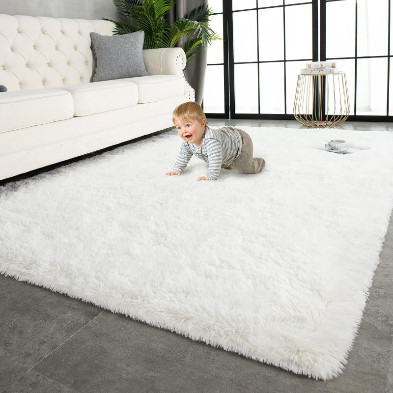 Photo 1 of GumoHK Oval Soft White Shaggy Rugs for Bedroom Plush Fluffy Area Rugs for Kids Room Beside Nursery Carpet Mats Modern Shag Round Rugs 1.5x7.5 