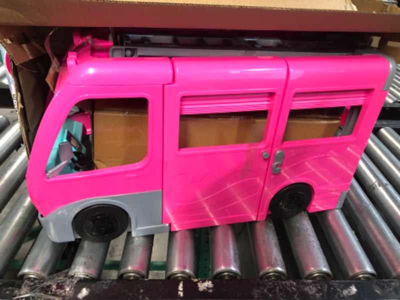 Photo 5 of Barbie Camper Playset, Dreamcamper Toy Vehicle with 60 Accessories Including Furniture, Pool and 30-Inch Slide