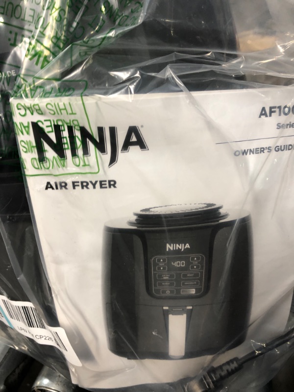 Photo 4 of **NONREFUNDABLE**FOR PARTS OR REPAIR**SEE NOTES**
Ninja AF101 Air Fryer that Crisps, Roasts, Reheats, & Dehydrates, for Quick, Easy Meals, 4 Quart Capacity, & High Gloss Finish, Black/Grey 4 Quarts