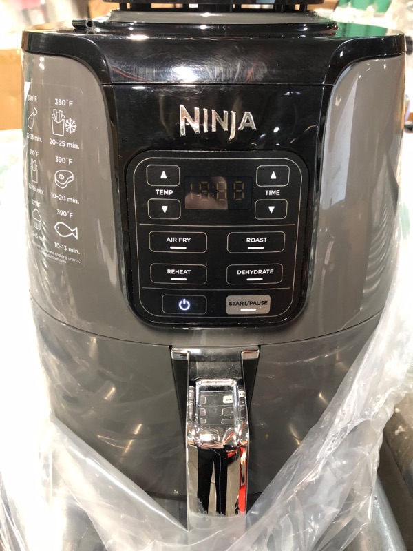 Photo 2 of **NONREFUNDABLE**FOR PARTS OR REPAIR**SEE NOTES**
Ninja AF101 Air Fryer that Crisps, Roasts, Reheats, & Dehydrates, for Quick, Easy Meals, 4 Quart Capacity, & High Gloss Finish, Black/Grey 4 Quarts