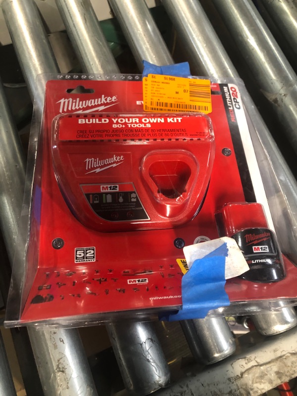 Photo 2 of Milwaukee M12 12-Volt Lithium-Ion Compact Battery Pack 2.0Ah and Charger Starter Kit