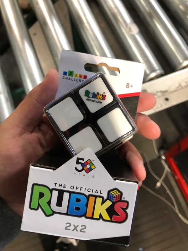 Photo 1 of Rubik's Mini, Original 2x2 Rubik's Cube 3D Puzzle Fidget Cube Stress Relief Fidget Toy Brain Teasers Travel Games, for Adults and Kids Ages 8 and up Mini 2x2