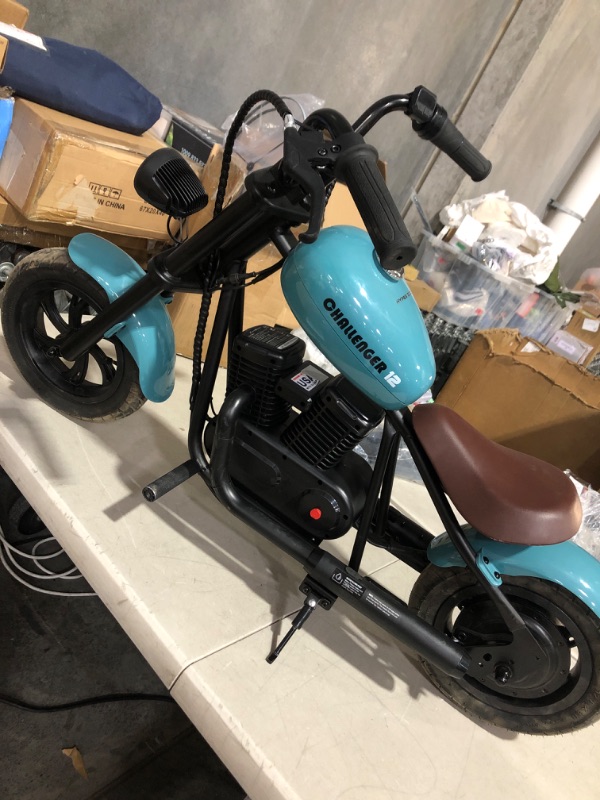 Photo 2 of Hyper GoGo Electric Motorcycle for Kid, [Great Gift to Kids Age 3+] Kids Electric Bike with Colorful Ambient Light, Music Speaker, 3 Gears Max 10Mph Up to 60 Minutes Continuous Ride Time(Black)