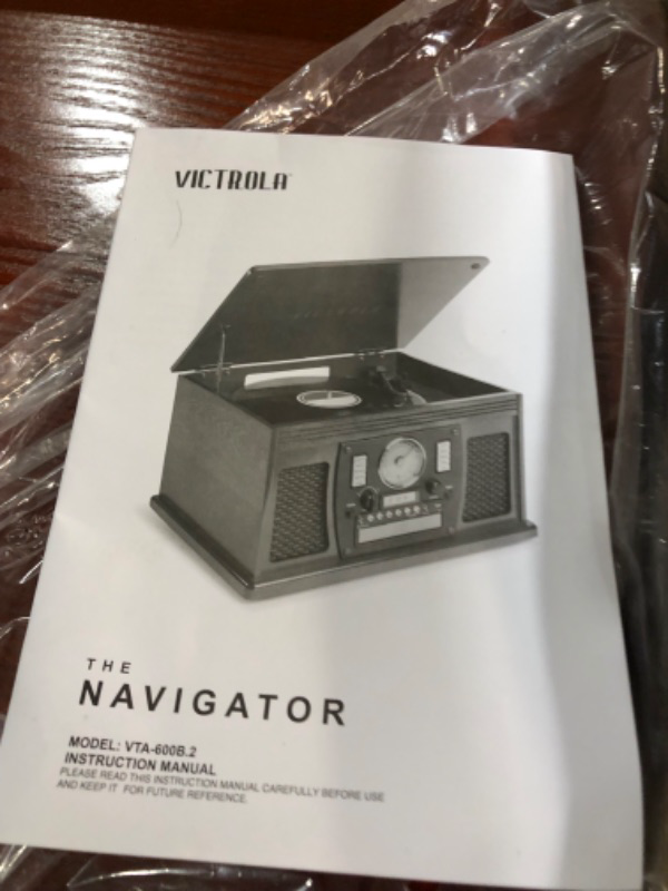 Photo 2 of * used * see all images * stand not included 
Victrola Navigator 8-in-1 Classic Bluetooth Record Player 