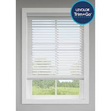 Photo 1 of ***DAMAGED - HAS BEEN CUT - IS SHORTER THAN ADVERTISED - HARDWARE MISSING - NO PACKAGING***
LEVOLOR Trim+Go 2.5-in Slat Width 72-in x 64-in Cordless White Faux Wood Room Darkening Horizontal Blinds
