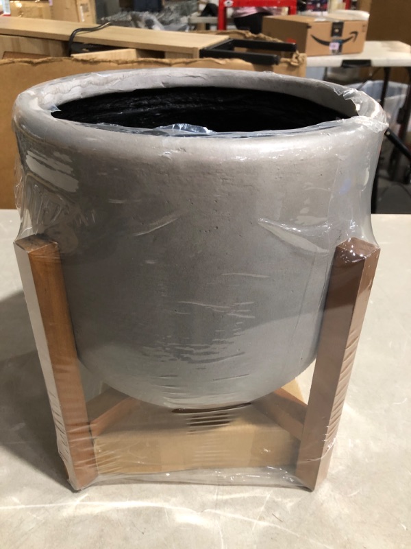 Photo 1 of * see images for damage *
Origin 21 - 14.5-in H x 8.5-in W Light Cement Round Wood Plant Stand